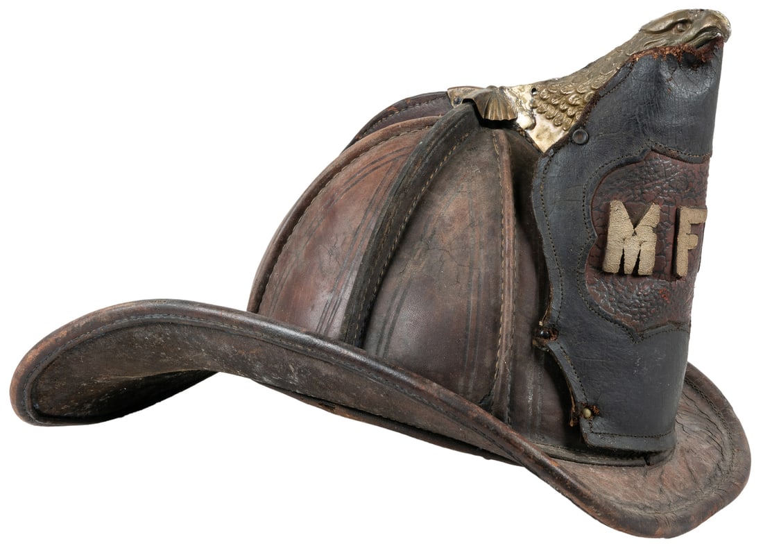 Cairns & Bro. Early Fire Helmet. With an eagle holder grasp... (1 of 3)