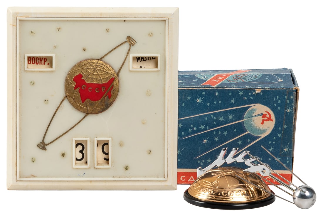 [SOVIET SPACE PROGRAM]. Group of 2 Sputnik-Related Souvenir... (1 of 2)