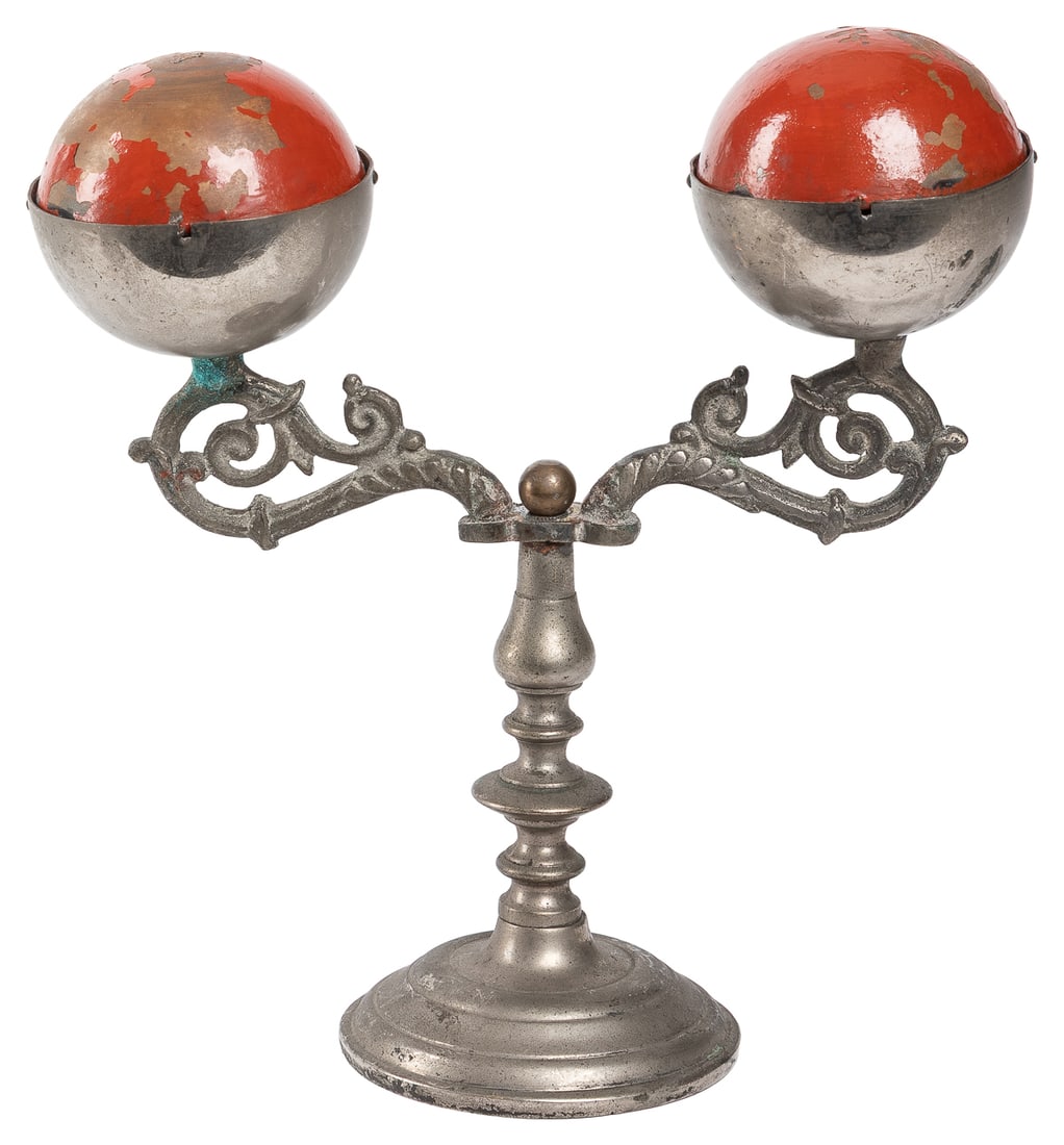 Double Billiard Ball Cup. Circa 1900. Mechanical cast metal...: Double Billiard Ball Cup. Circa 1900. Mechanical cast metal stand with two arms holding short nickel-plated cups, each gimmicked for the production of a single red billiard ball. Height 6 ¼”