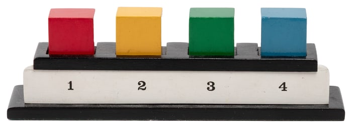 Mini Mental. Middlesex: Alan Warner, 1990s. Four colored bl...