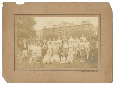 Cabinet photo of Mighty Haag Circus wagon and performers. C...