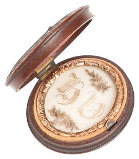 Antique Cased Hair Mourning Display. Circa 19th century. Ov...: Antique Cased Hair Mourning Display. Circa 19th century. Oval gutta percha case enclosing a memorial display with the initials HD. 2 1/8 x 1 ¾”. Very good.