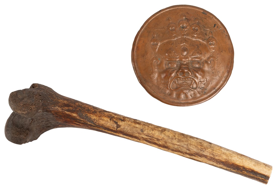 Kangling Human Bone Trumpet. Sikkim, India, ca. 19th centur...: Kangling Human Bone Trumpet. Sikkim, India, ca. 19th century specimen with museum number and label. Length 12”. Also with a copper repoussé disk of a Tibetan Demon.