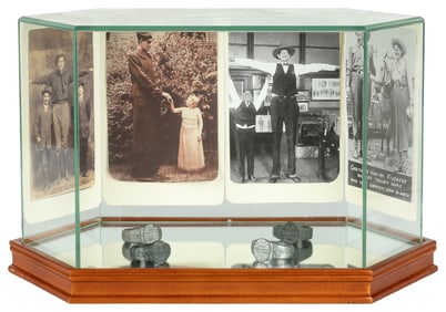 [GIANTS]. Glass Display Case of Circus Giant Souvenir Rings...