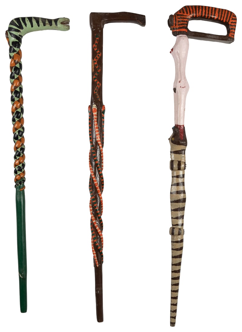 GOODPASTER, Denzil (American, 1908-1995). Three Carved Cane...: GOODPASTER, Denzil (American, 1908-1995). Three Carved Canes: Nude Woman with Animals and Two Snake Canes. Not dated. Carved and painted wood. Unsigned. Largest 35 ½ h x 7 ½ w x 2” d. 