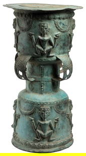 Indonesian Handcrafted and Wrought Iron Drum. 20th century....: Indonesian Handcrafted and Wrought Iron Drum. 20th century. 21 h x 12” diameter. Beautiful decorative figures and patterns adorn this piece. Some areas bent at perimeter of the top. Overall good