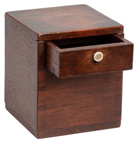Davenport Cabinet. Circa 1875. A coin or small object inser...