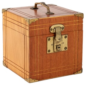 Nest of Boxes. Circa 1975. A borrowed watch or ring is vani...