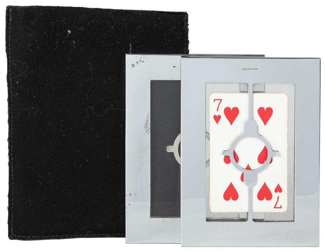 Penetration Frame. New York: Ludwig Krug, ca. 1935. A solid...: Penetration Frame. New York: Ludwig Krug, ca. 1935. A solid sheet of glass secured in a chrome metal frame is pierced by a pencil yet remains unharmed and without a hole when examined minutely by spec