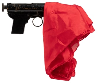 Color Changing Silk Pistol. European, ca. 1935. A red handk...