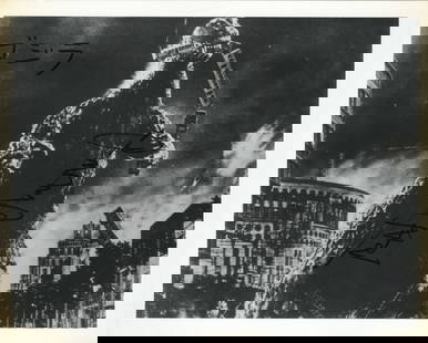 [GODZILLA]. NAKAJIMA, Harou (1929-2017). Signed Photo. Blac...: [GODZILLA]. NAKAJIMA, Harou (1929-2017). Signed Photo. Black and white photo of Godzilla attacking a train (probably from Gojira (1954)). Signed by Nakajima and with his caption