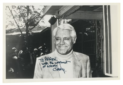 Cary Grant Signed Photograph. Black and white photograph on...