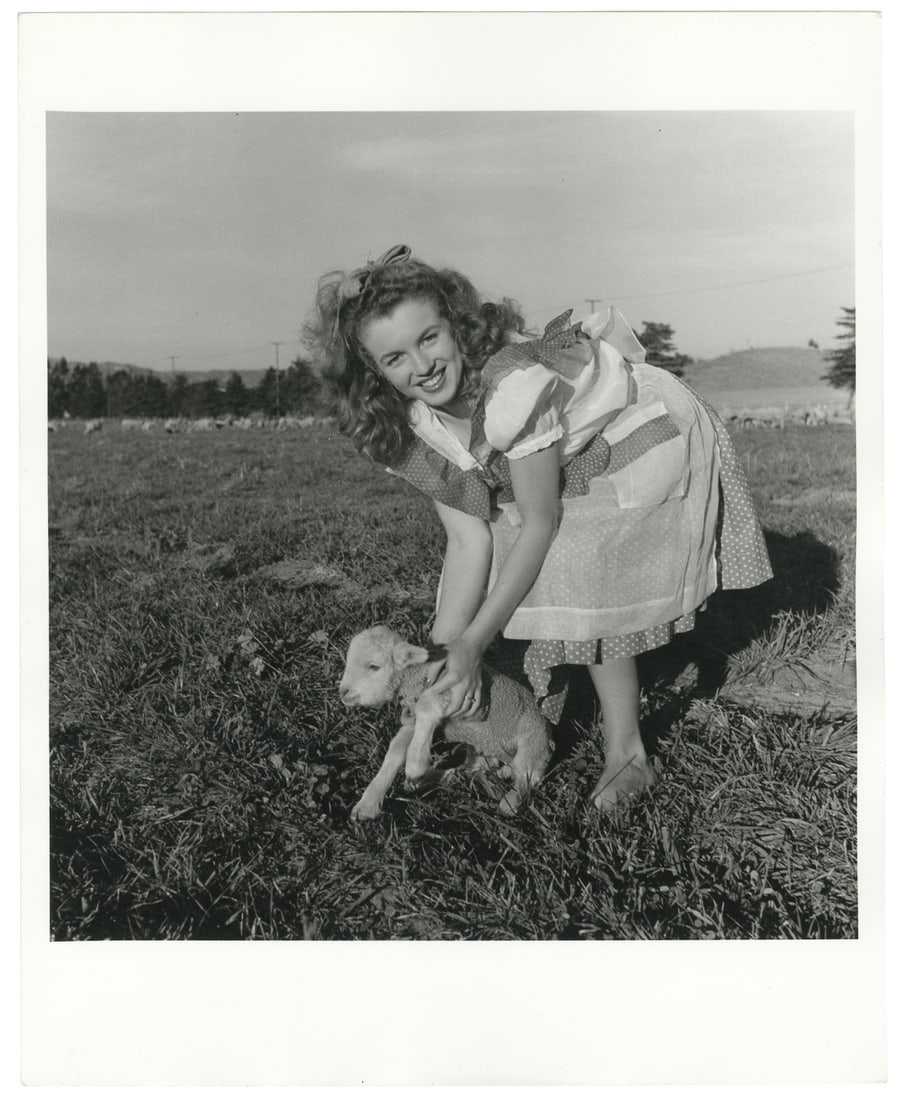 (MONROE, Marilyn). Norma Jeane Dougherty in Pinafore Dress ... (1 of 2)