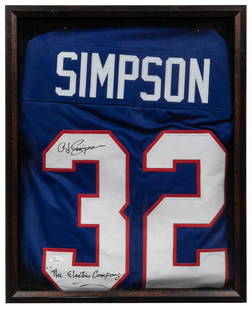 O.J. Simpson Signed Bills Jersey (JSA). A #32 jersey signed...: O.J. Simpson Signed Bills Jersey (JSA). A #32 jersey signed in black Sharpie by Simpson, adding &#8220;The Electric Company&#8221; below on the same numeral. JSA authentication. Framed overall, 22 x 1