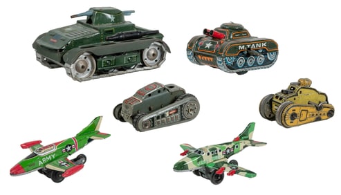 Group of 6 tin tank and fighter plane toys. Includes an Arn...