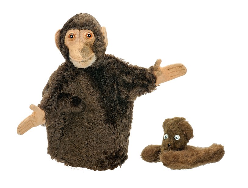 Cardini’s hand puppets.: Cardini’s hand puppets. One a small brown bear finger puppet, the other a larger monkey puppet. Used by Cardini when entertaining on USO shows, as an adjunct to close-up card tricks he performed. Bo