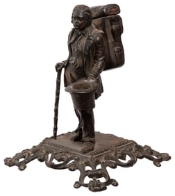 Cast Iron Traveler Match Holder / Striker. Depicting a man ...