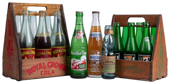 Group of Soda Bottles and Two Six-Pack Carriers. Circa mid-...