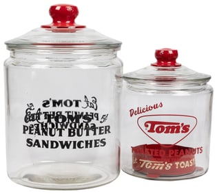 Pair of Tom’s Peanuts Glass Jars. Circa 1940s. Including ic...