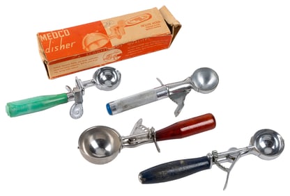 Group of Four Round Bowled Ice Cream Scoops. Circa 1930s. I...