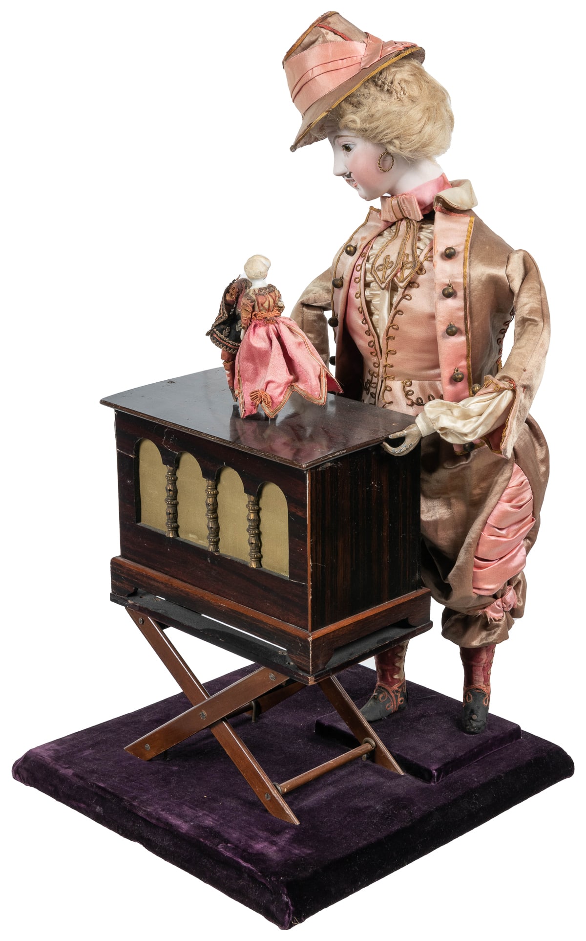[AUTOMATON]. Organ-Grinder. Paris: Vichy, ca. 1880. Musical...: [AUTOMATON]. Organ-Grinder. Paris: Vichy, ca. 1880. Musical mechanical automaton of a street organ performer. Exhibits painted bisque head with glass eyes, a heavily adorned face, and a blond mohair w