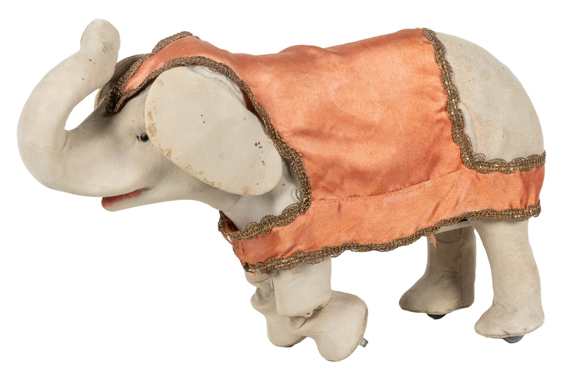 Walking Elephant Automaton. Paris: Roullet & Decamps, ca. 1...: Walking Elephant Automaton. Paris: Roullet & Decamps, ca. 1900. Suede-covered elephant figure with painted trunk, silk covering. Wind-up mechanism with stop/start lever on figure’s underside. Wh