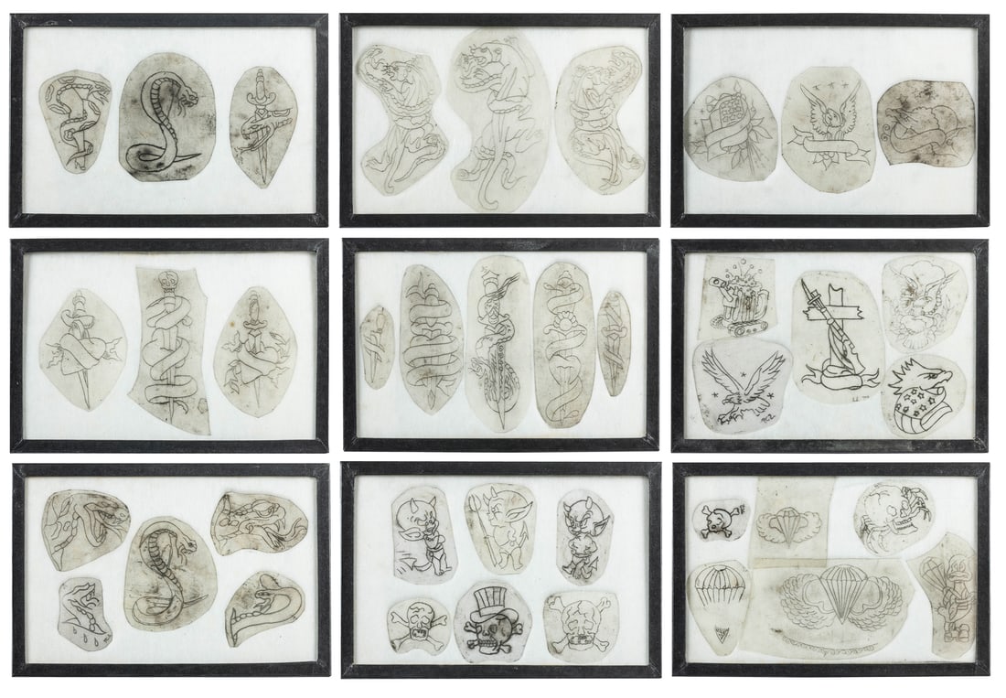 Group of 39 tattoo stencils. American, ca. 1980s-90s. 39 ac...: Group of 39 tattoo stencils. American, ca. 1980s-90s. 39 acetate stencils, various designs including eagle, skull, devil, snakes, panthers, daggers, and more. Cut-out stencils generally 6 x 3 ½&#