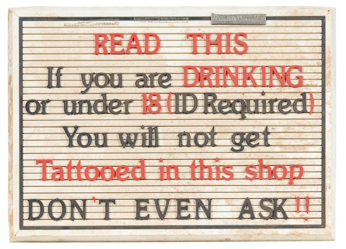 Tattoo shop sobriety and age requirement sign. Circa 1970s-...: Tattoo shop sobriety and age requirement sign. Circa 1970s-80s. Molded plastic sign, with red and black plastic lettering. Dust and dirt accumulation. From the shop of Dr. Tatu (Dale Spratlin), Mablet