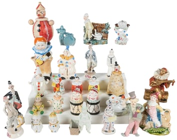 Group of 28 Clown Figurines. Group of porcelain, ceramic, w...