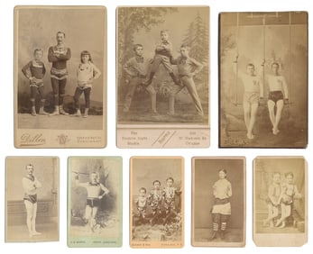 [ACROBATS & GYMNASTS]. Group of 20 CDVs and three cabinet c...