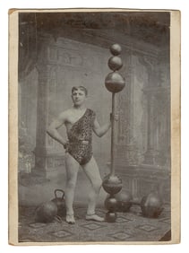 Cabinet photo of a strongman. Circa 1880s-90s. Photograph o...
