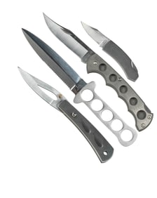 Grouping of Steel and Titanium Knives. U.S.A. and Japan. Fo...