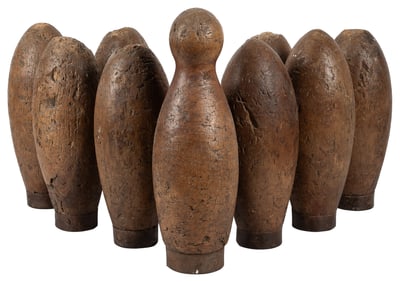 Skittles Lawn Bowling Set. Nine carved wood pins with metal...