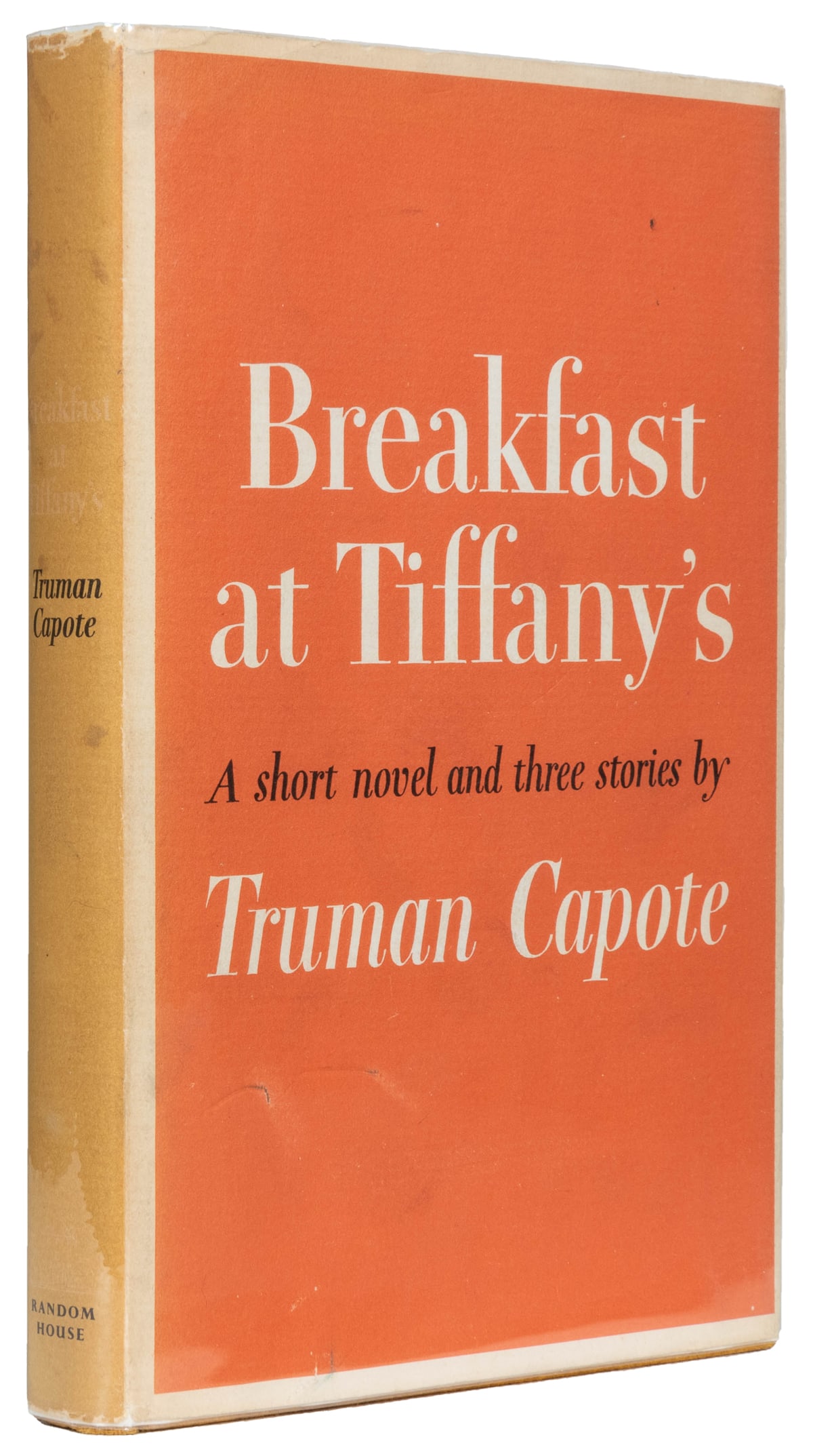 CAPOTE, Truman (1924-1984). Breakfast at Tiffany’s. A Short...: CAPOTE, Truman (1924-1984). Breakfast at Tiffany’s. A Short Novel and Three Stories. New York: Random House, [1958]. 8vo. 179, [5, blank] pp. Publisher’s full yellow cloth, spine stamped i