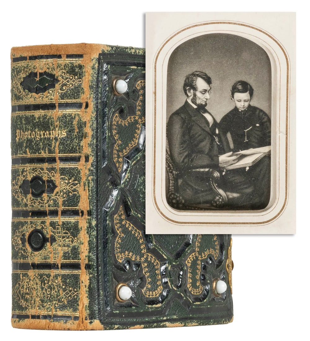 [LINCOLN, Abraham]. Album of 14 CDVs. 1860s. Clasping photo... (1 of 5)