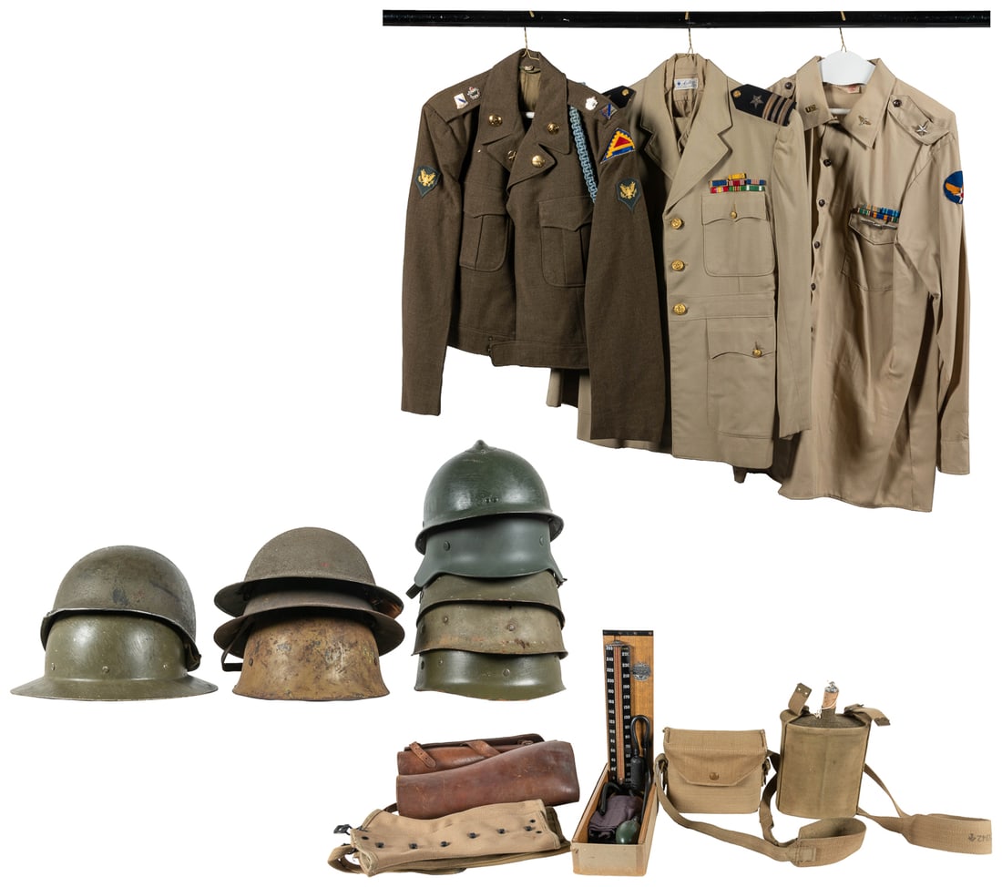 [MILITARIA]. Large group of helmets, uniforms, and field ge... (1 of 8)