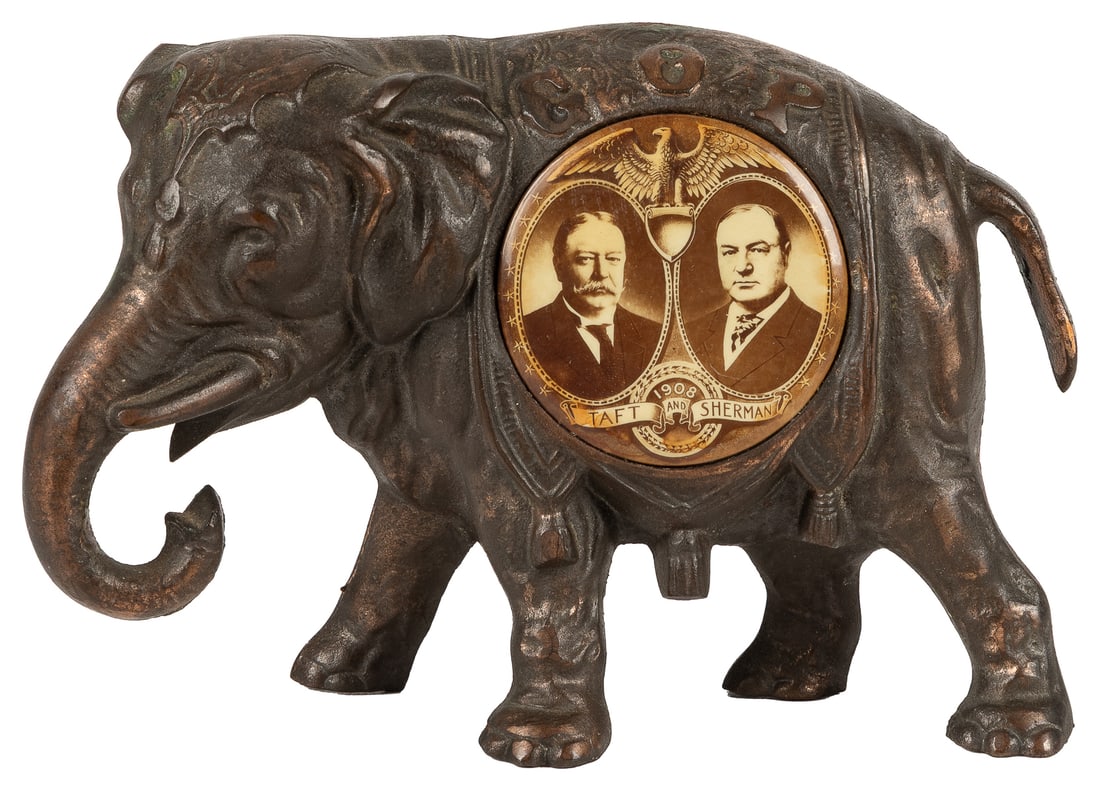 [TAFT, William Howard (1857-1930)]. Taft and Sherman Campai...: [TAFT, William Howard (1857-1930)]. Taft and Sherman Campaign Figurine. 1908. A pot metal elephant with an inset celluloid jugate button for Taft & Sherman’s 1908 successful campaign. Elephant