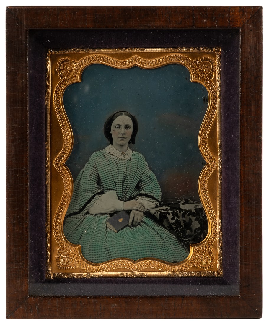 [EARLY PHOTOGRAPHY]. Hand-Colored Daguerreotype of a Young ... (1 of 3)