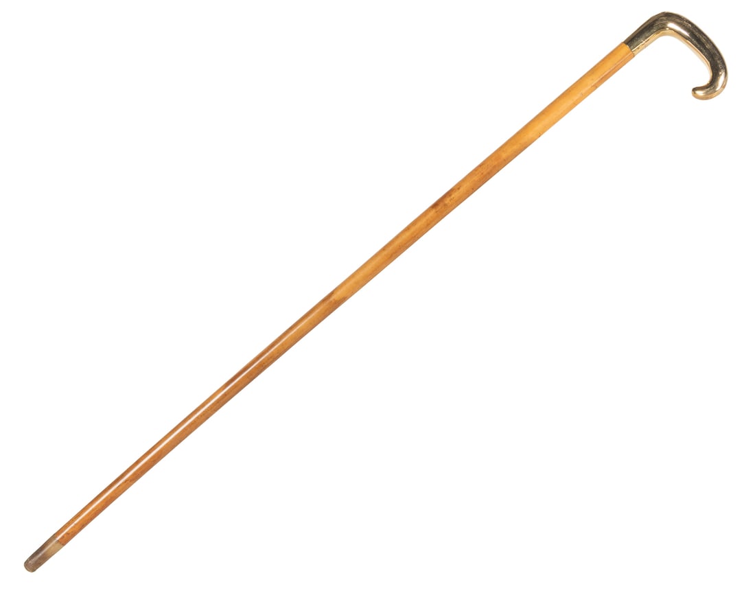 Tiffany & Co. 18k Gold Handled Cane. Polished wooden shaft,...: Tiffany & Co. 18k Gold Handled Cane. Polished wooden shaft, the handle marked by Tiffany & Co. 18k. Monogrammed “GK” and with the date April 1926. Length 35 ½”.