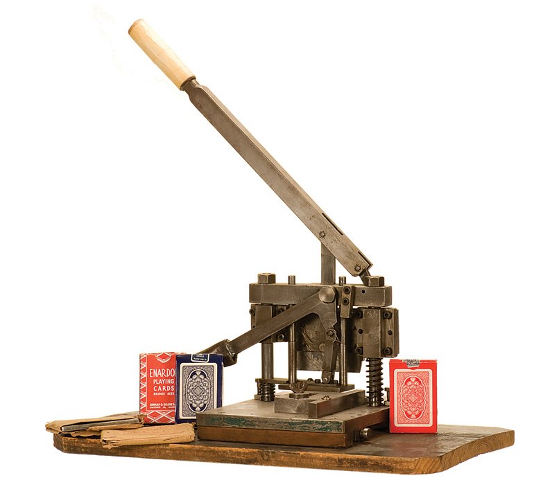 Heavy Duty Card Trimmer. Manufacturer unknown, ca. 1960: Heavy Duty Card Trimmer. Manufacturer unknown, ca. 1960. Recovered from the Enardoe Playing Card Co., Chicago, and can cut more than one deck at a time. Comes with two extra blades and three decks of 