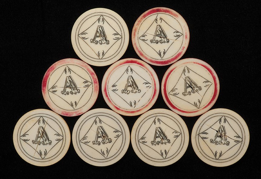 Nine Ivory Poker Chips. Circa 1890. Initial “A”: Nine Ivory Poker Chips. Circa 1890. Initial “A” (5 white, 4 red). 1 ½” diameter. Very good condition.