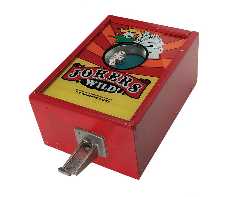 One Cent Jokers Wild Coin Operated Gambling Machine.: One Cent Jokers Wild Coin Operated Gambling Machine. Monarch Product Sales Corp., Covington, Kentucky, ca. 1970. 15 x 11 x 7”. Good.