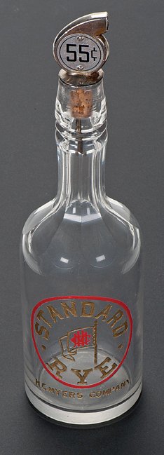 Back Bar “Standard Rye” Whiskey Bottle.: Back Bar “Standard Rye” Whiskey Bottle with Cork Stopper and Metal Pourer. American, ca. 1890. Gold leaf lettering. Fifty five cents a shot. Very good.