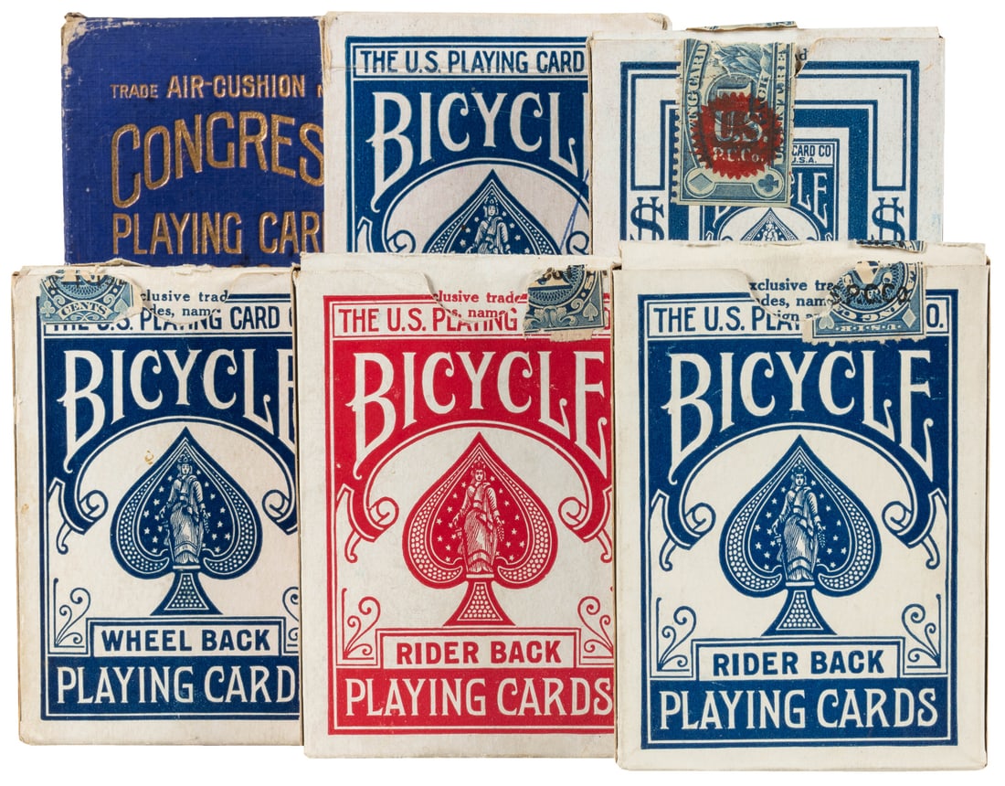 Group of 12 vintage USPC Bicycle decks. Including: Rider Ba...: Group of 12 vintage USPC Bicycle decks. Including: Rider Back (red and blue backs); Wheel Back; Racer Back; Lotus (no box); New Fan Back (no box, with inner wrapper); Expert Back (one red, one blue, n