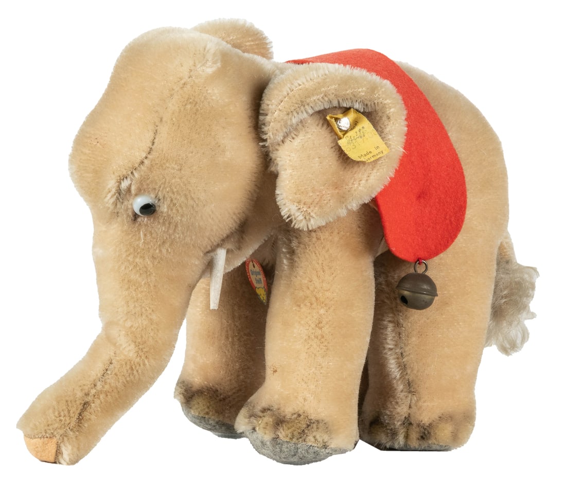 Steiff Postwar Elephant. Mohair elephant with red felt blan...: Steiff Postwar Elephant. Mohair elephant with red felt blanket, chest and ear tags retained. Height 6 ½”.