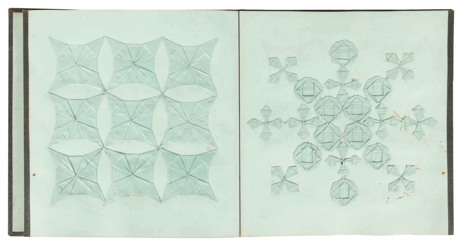 [ORIGAMI]. Victorian Album of Folding Paper and Origami Samples.: [ORIGAMI]. Victorian Album of Folding Paper and Origami Samples. Circa 1890. Clothbound display album of hinged sheets gilt stamped with a patterned border and the title “FOLDING” to the
