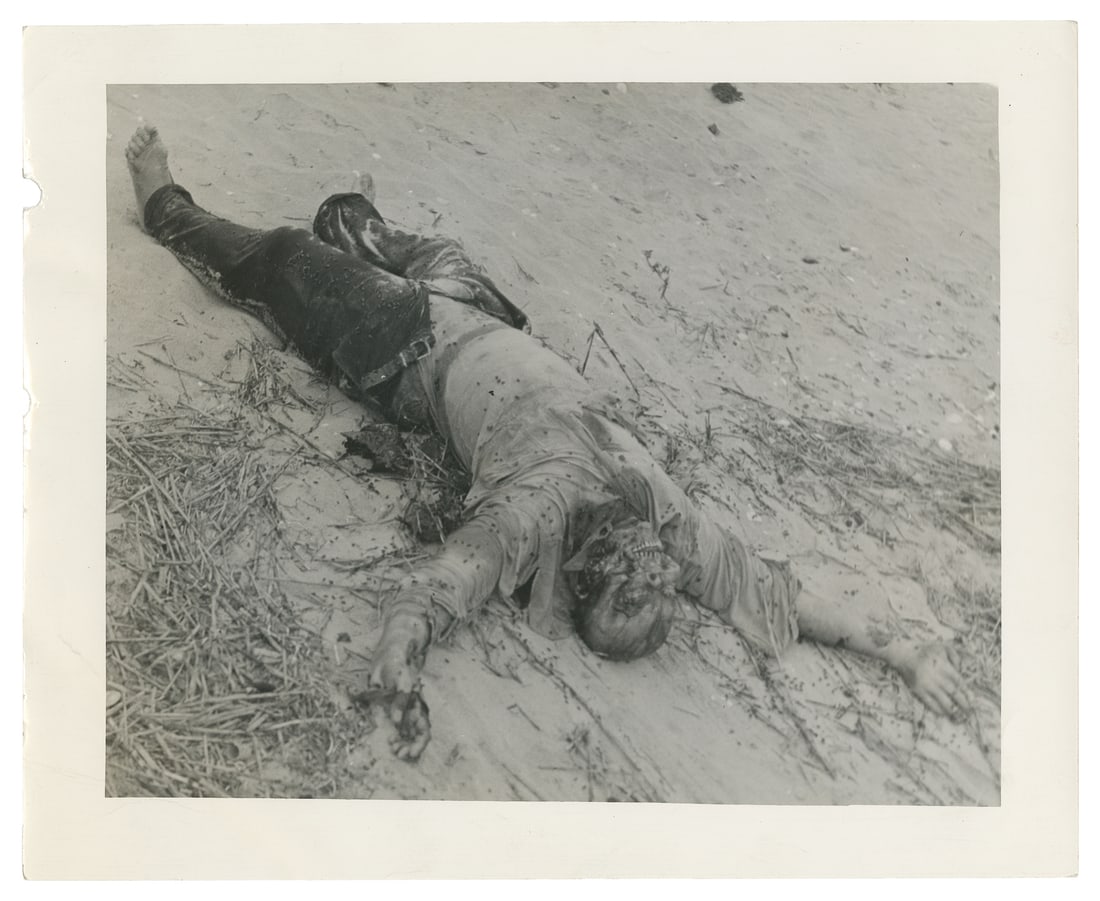 Body on the Beach. Three silver gelatin print photographs showing a deceased body on a beach from se (1 of 3)