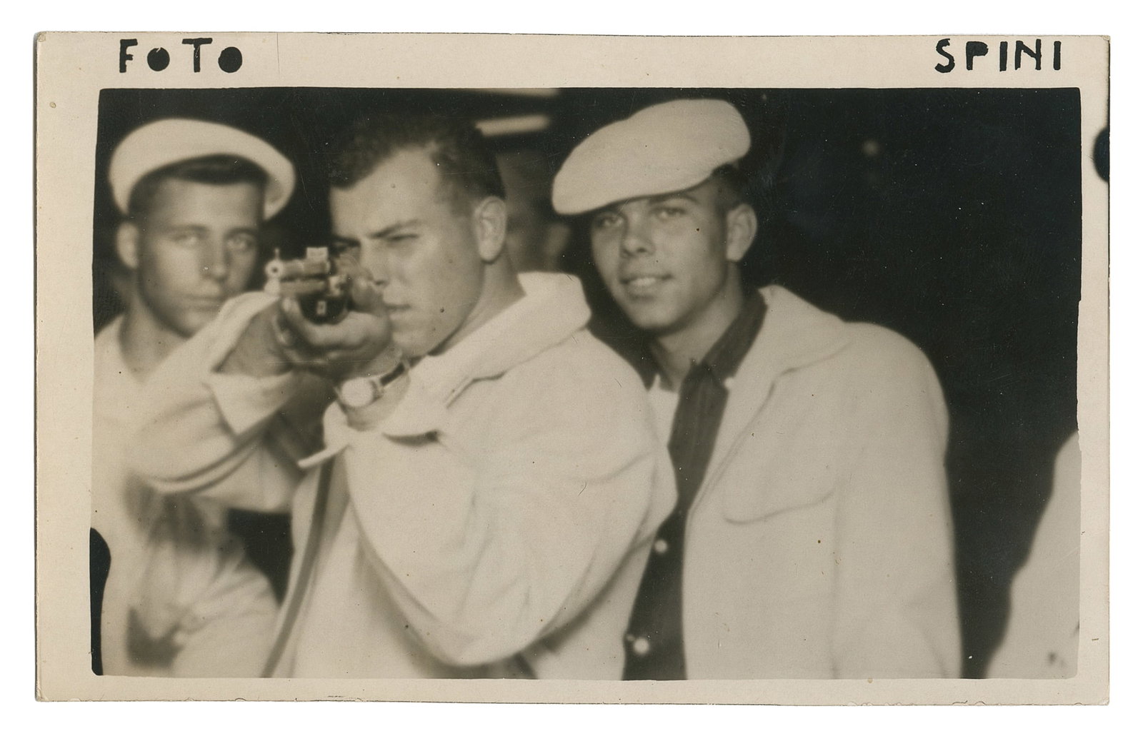 Automatic arcade shooting gallery photo of three men. (1 of 2)