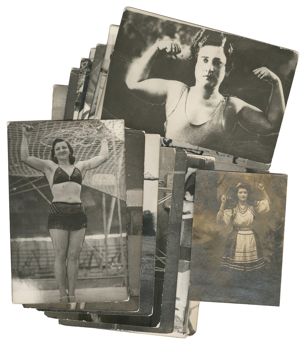 Lot of 16 photos of strongwomen and circus performers.: Lot of 16 photos of strongwomen and circus performers. Circa 1940s. Photographs of women flexing, lifting barbells, lifting other people; also with some acrobatic performer photos. Some appear to
