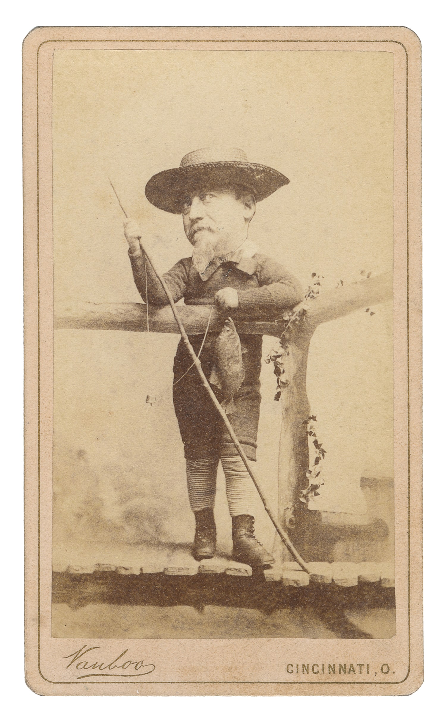 Exaggeration head CDV of a fisherman. : Exaggeration head CDV of a fisherman. Cincinnati: Vanboo, ca. 1880s. CDV with photo manipulation with a man's head on a boy's body, holding a fishing rod.
